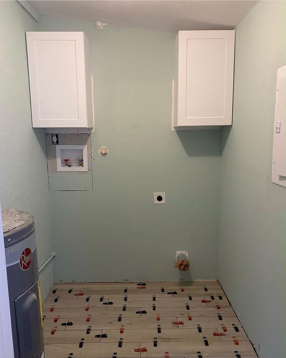 Laundry room tile installation
